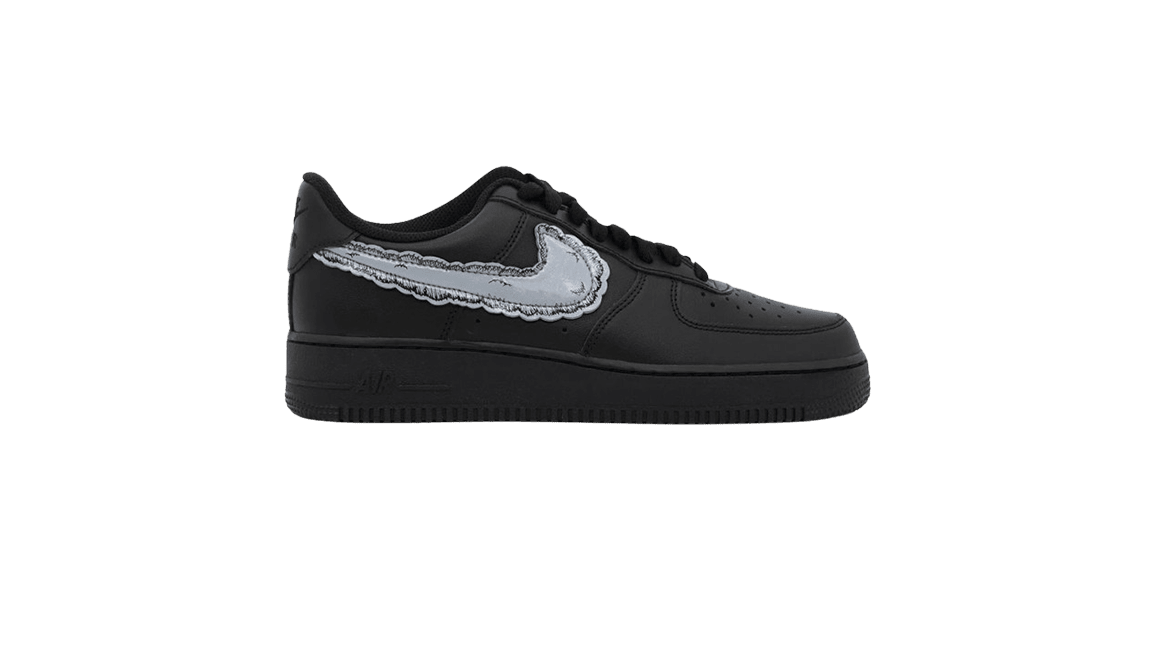 Kaws x Nike Air Force 1 Black Forty Four Sneaker