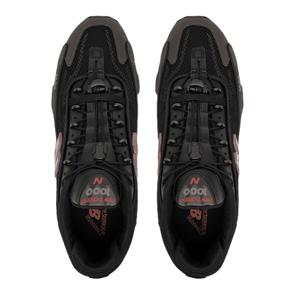 New Balance 1000G Black Metallic Red Rock Oben U100010A